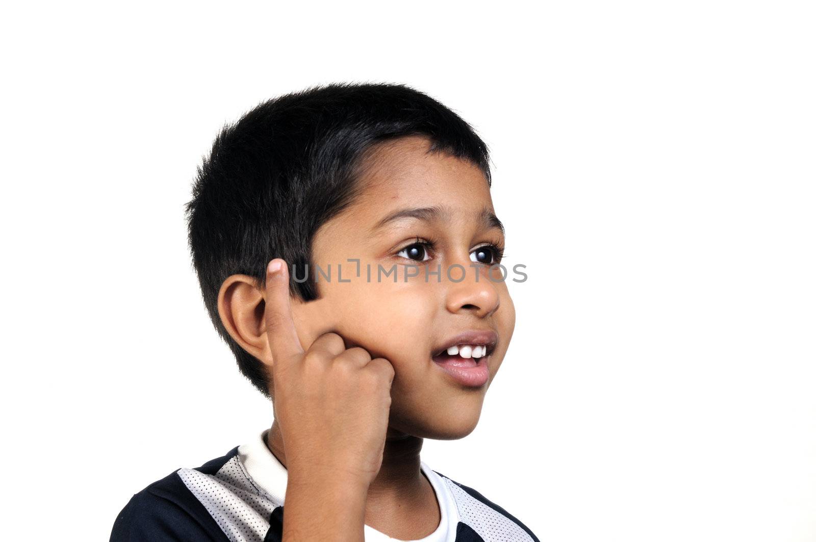 an handsome young indian kid thinking about something