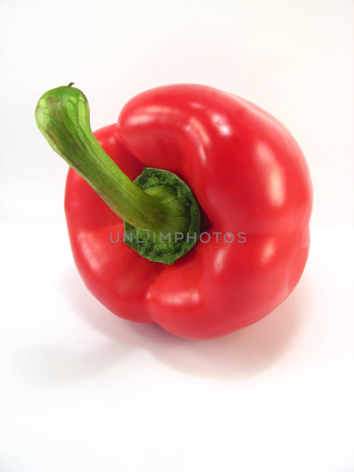 a red pepper on a white background