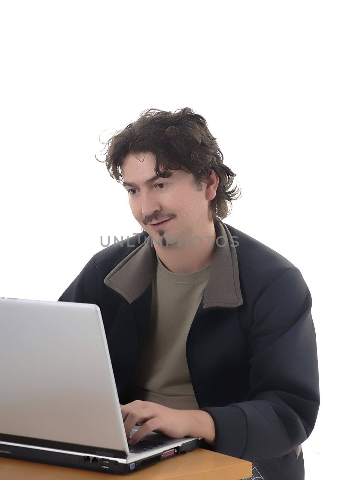 casual young man portrait wirking with personal computer