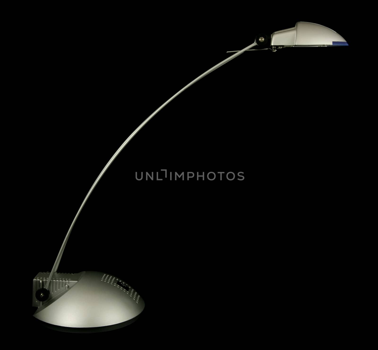 Halogen desk lamp isolated on black