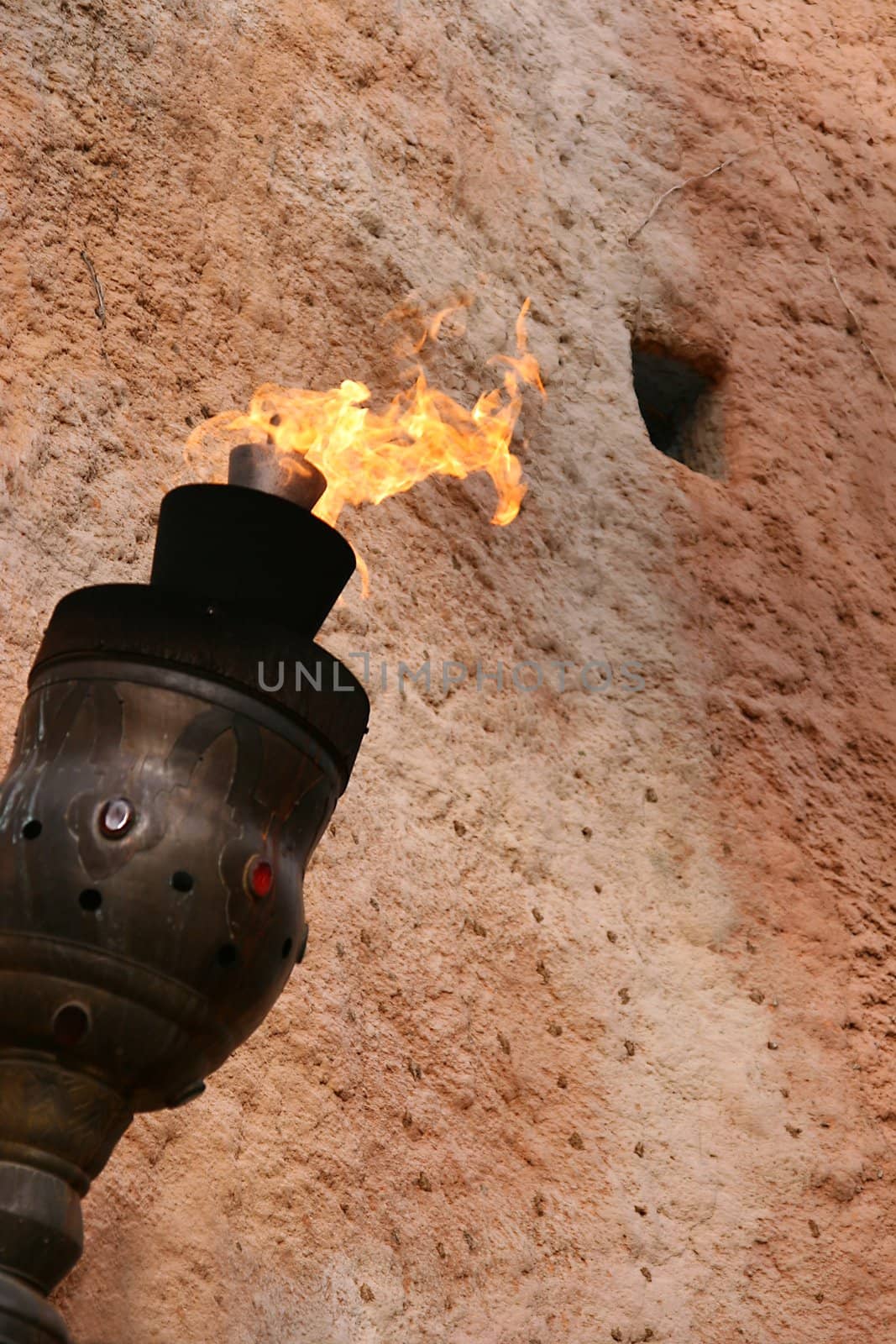 Medieval torch on a wall