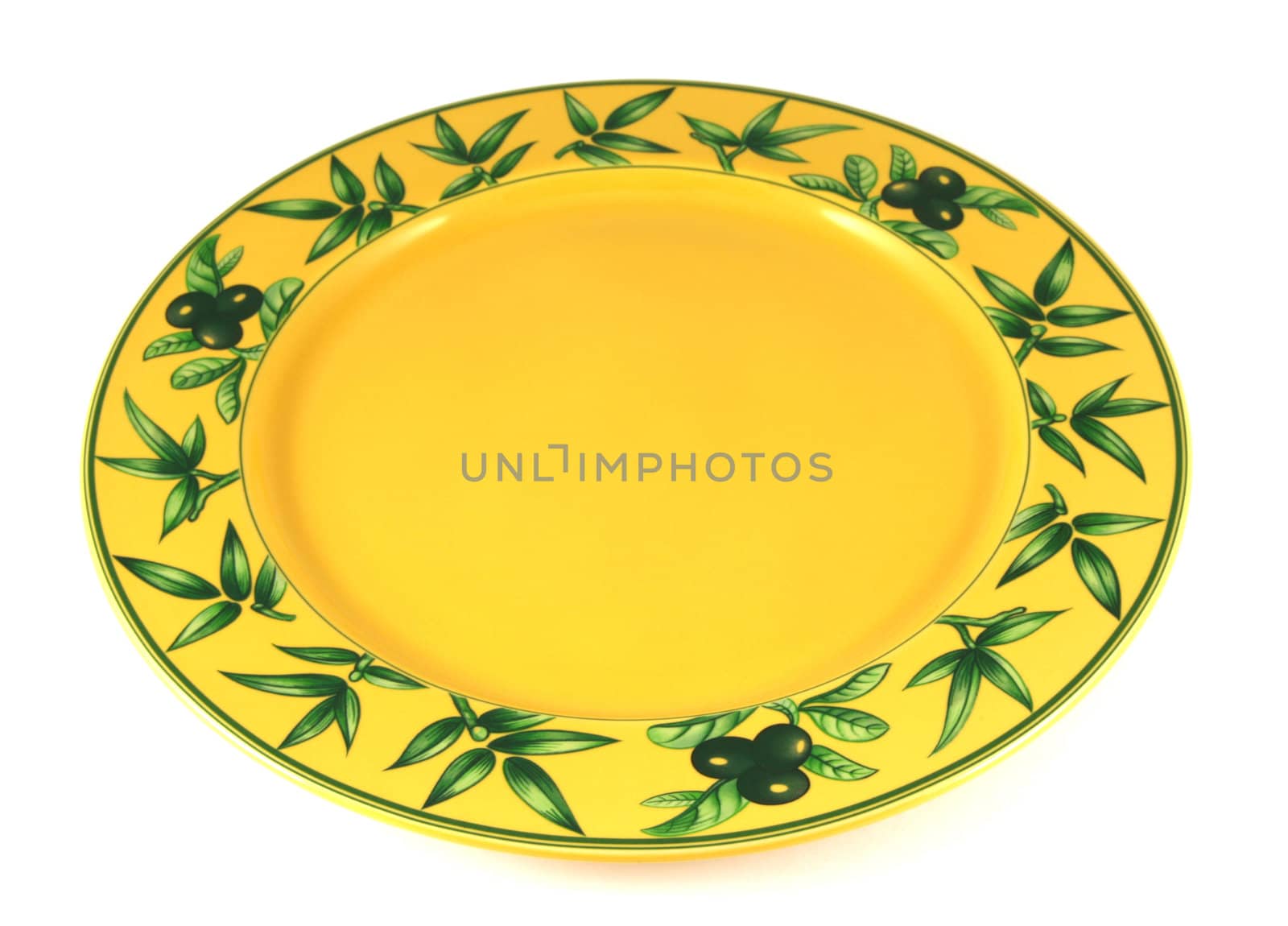 Yellow decorated empty plate isolated on white