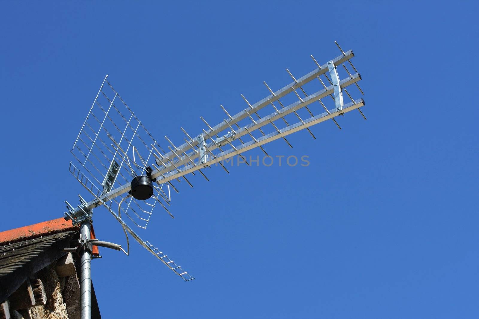 Digital terrestrial television antenna, over a blue sky