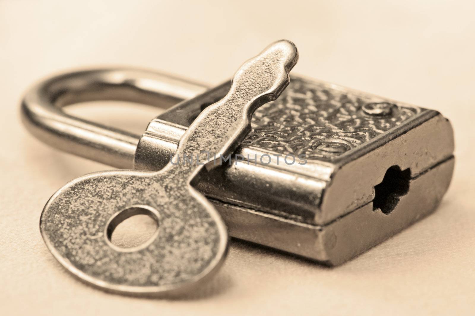 Close-up of a padlock and key