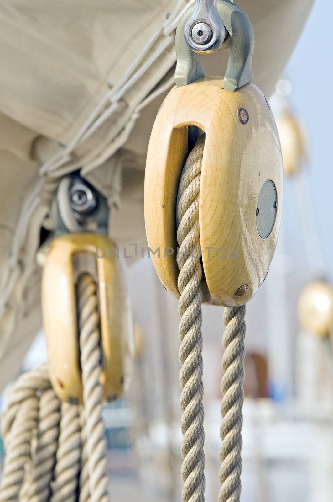 Old wooden pulleys on a sailing boat