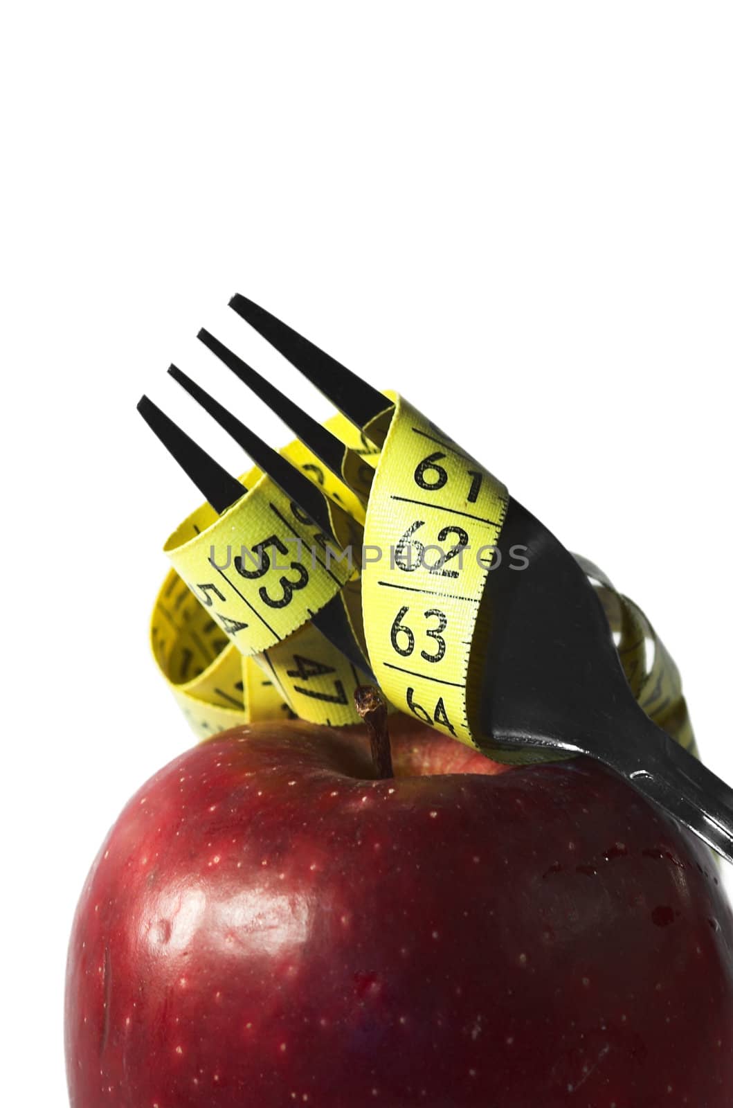 apple, autumn, centimeter, centimetre, crutch, cutlery, diet, drew, drop, eat, fall, fork, fruit, loose, measure, prong, red, vitamin, water, weight, yellow, 