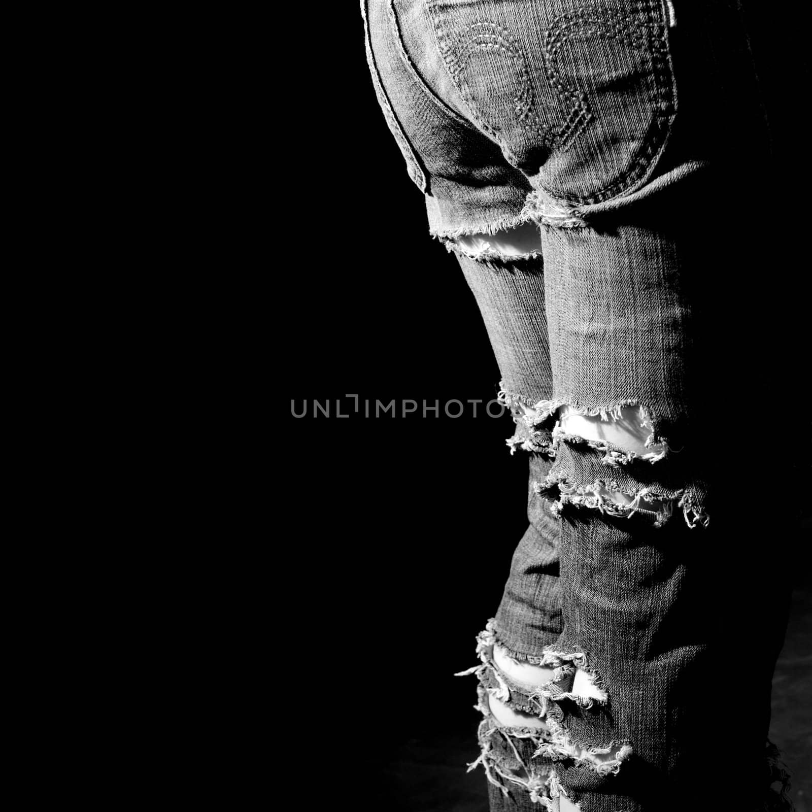 Lacerated jeans, ragged  pants, girl,  black background