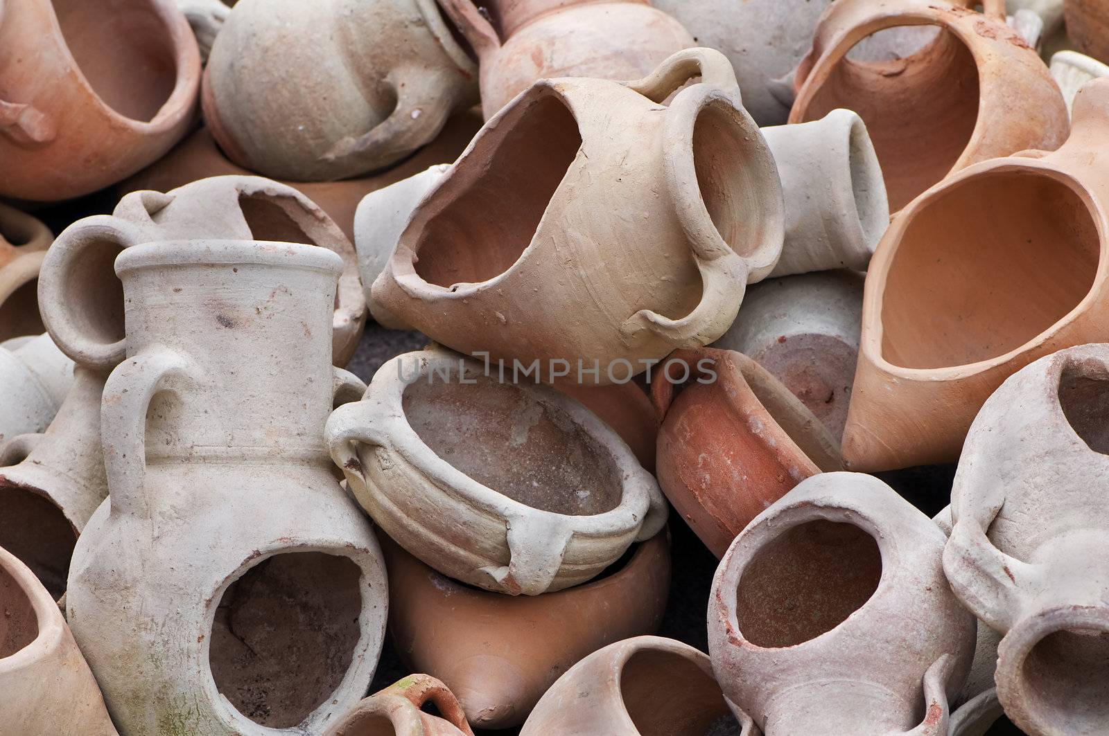 Stack of different kind of decorative terracotta containers