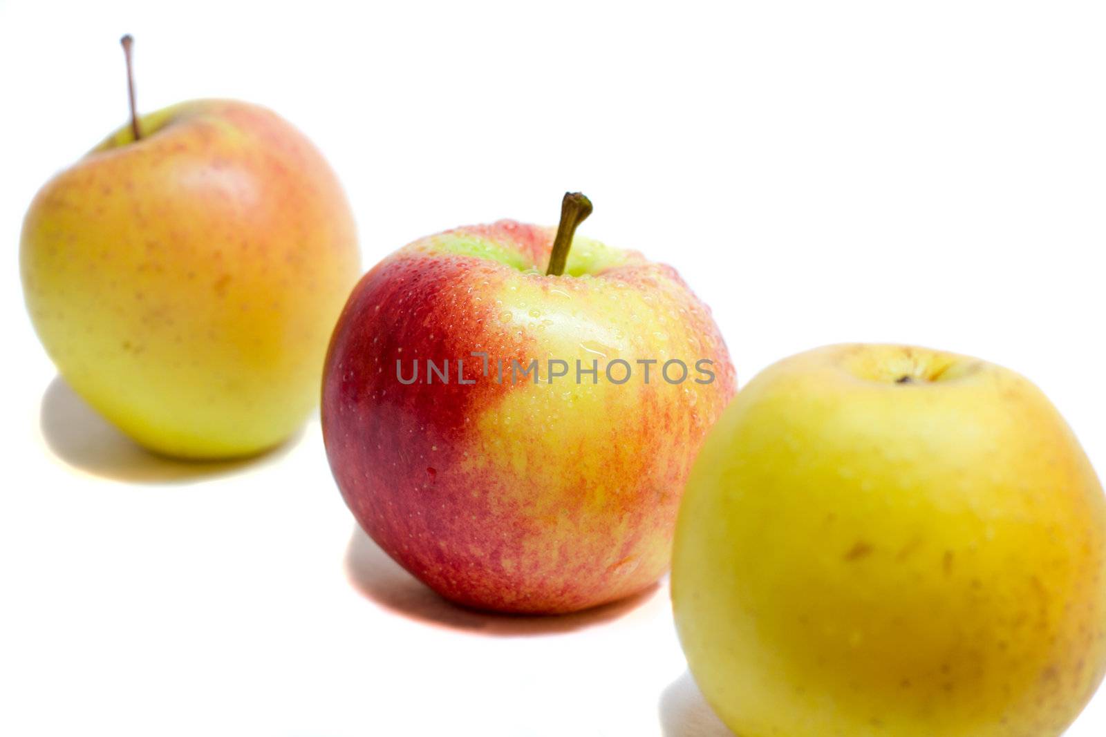 apples, red between yellow by Alekcey