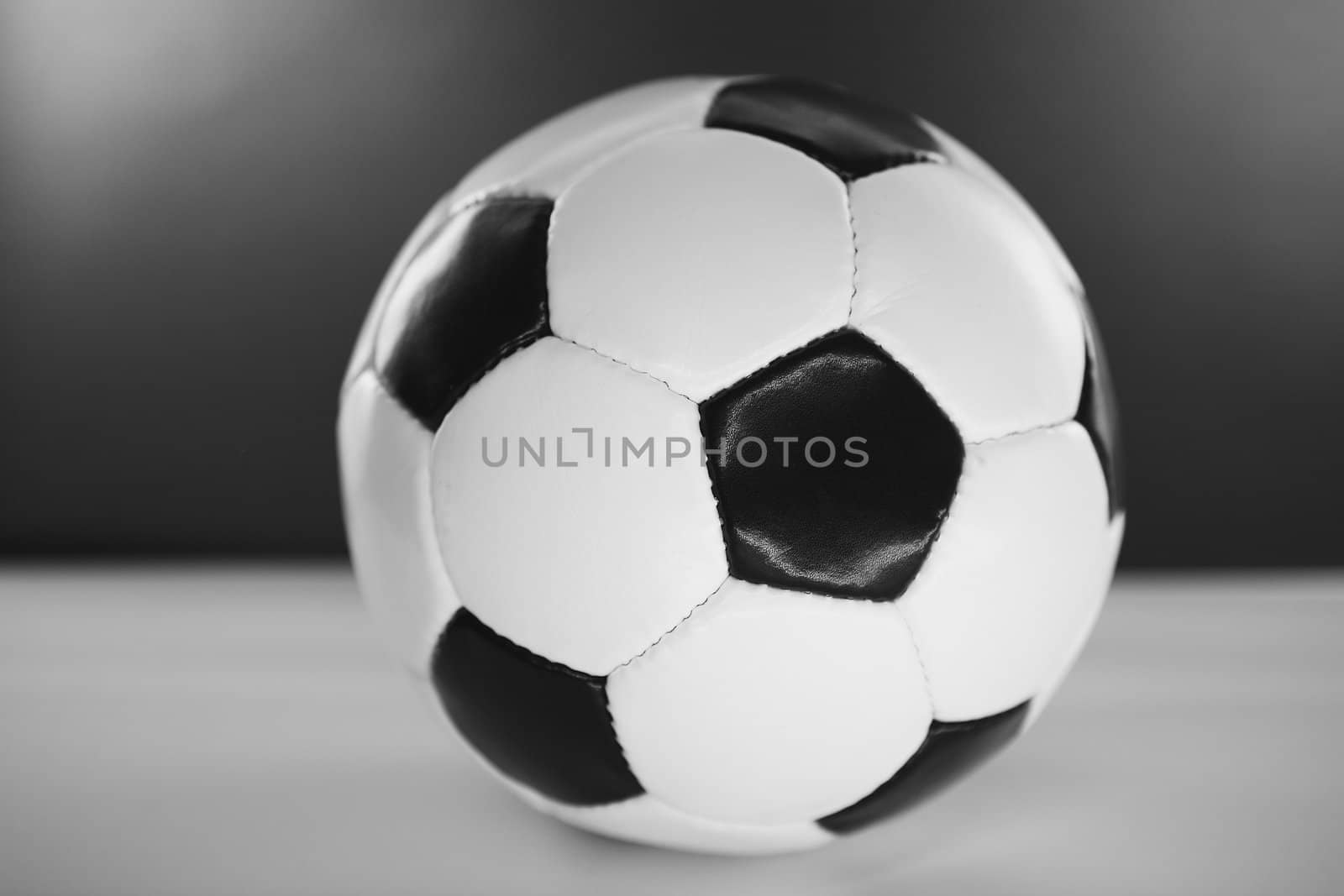 Soccer ball, black and white studio shot