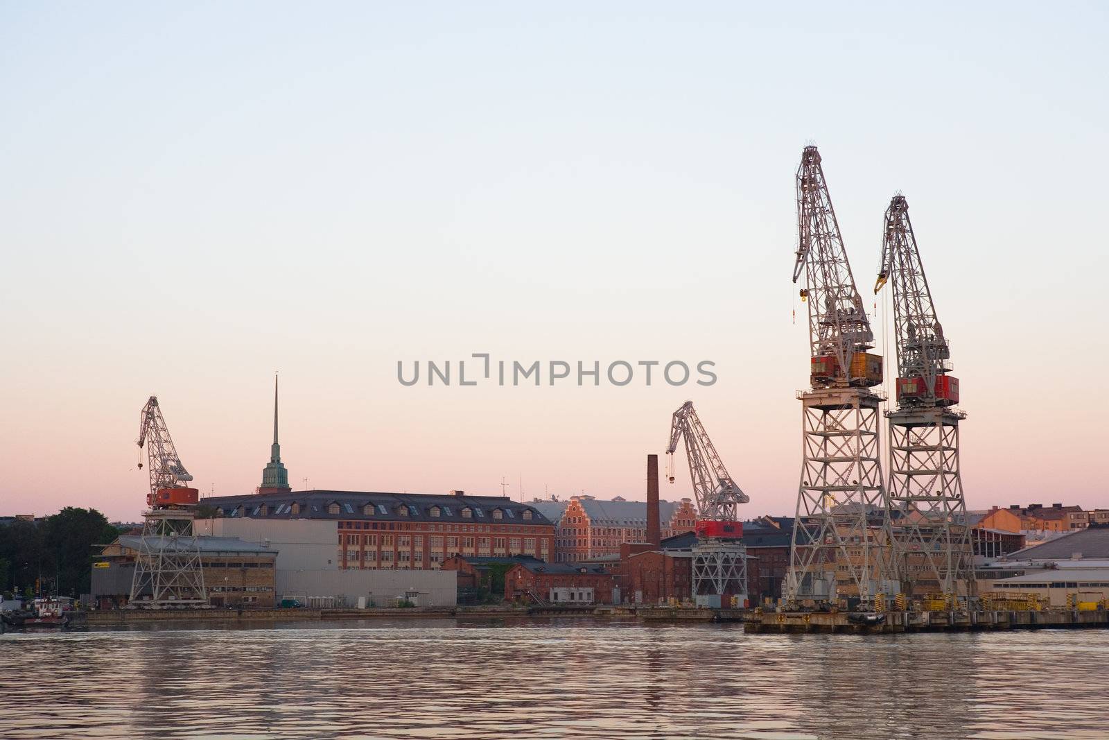 Cranes at industrial harbor in Helsinki
