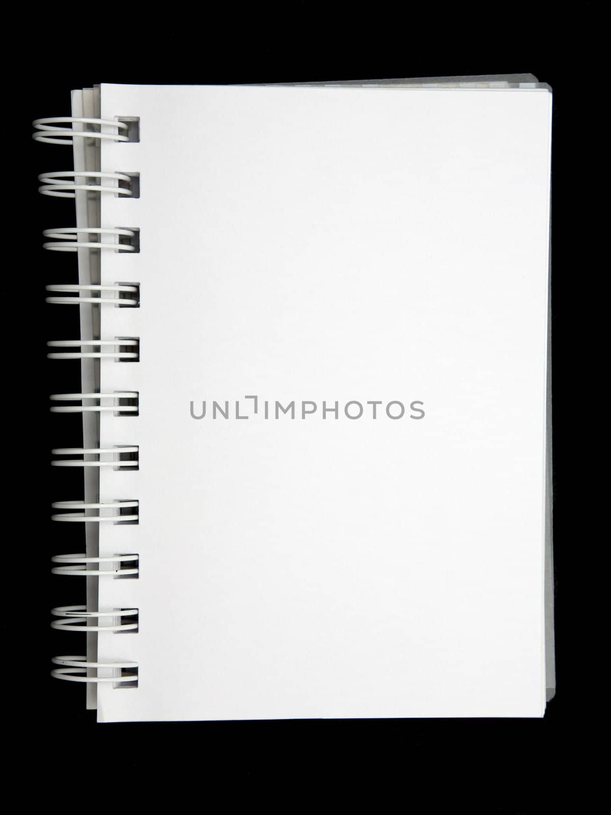 Open blank notebook on a black background