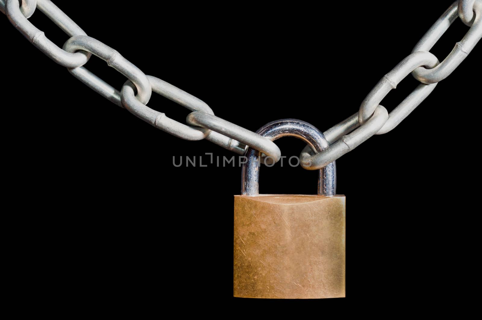 Brass padlock and locked onto a heavy galvanised chain, isolated on a black background