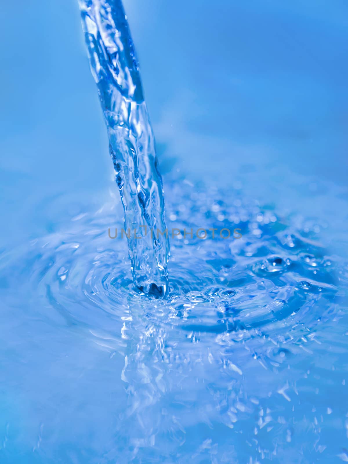 Pouring water stream abstract background