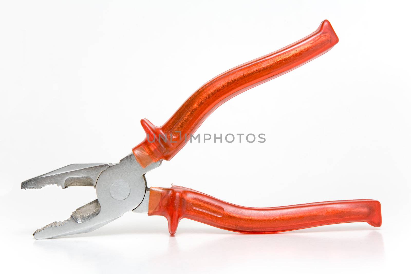 Tongs with red handles on a white background