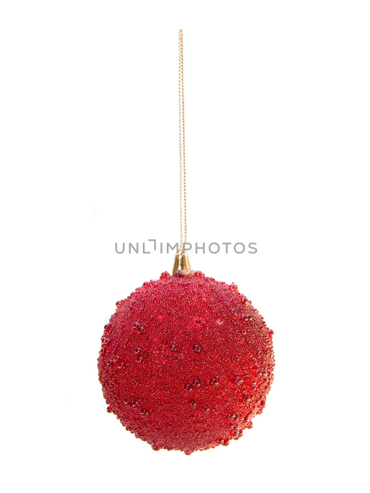 Red christmas bauble hanging in isolation