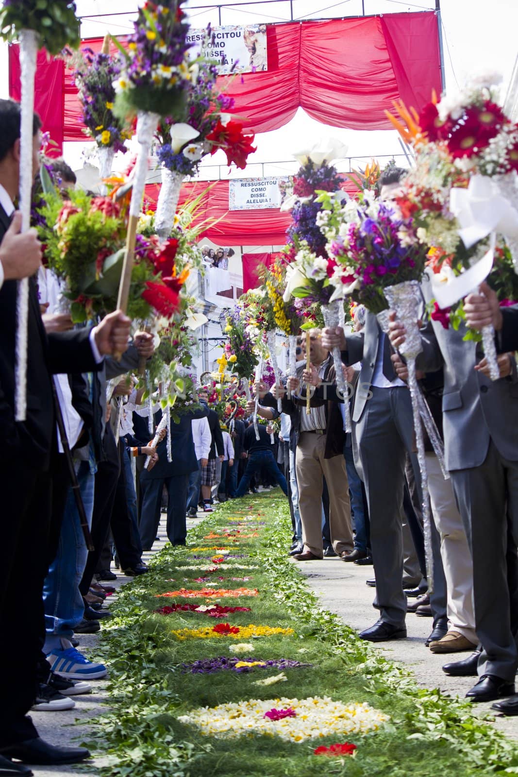 Beautiful procession of torches decorated with flowers, held in S.Bras de Alportel, Portugal.