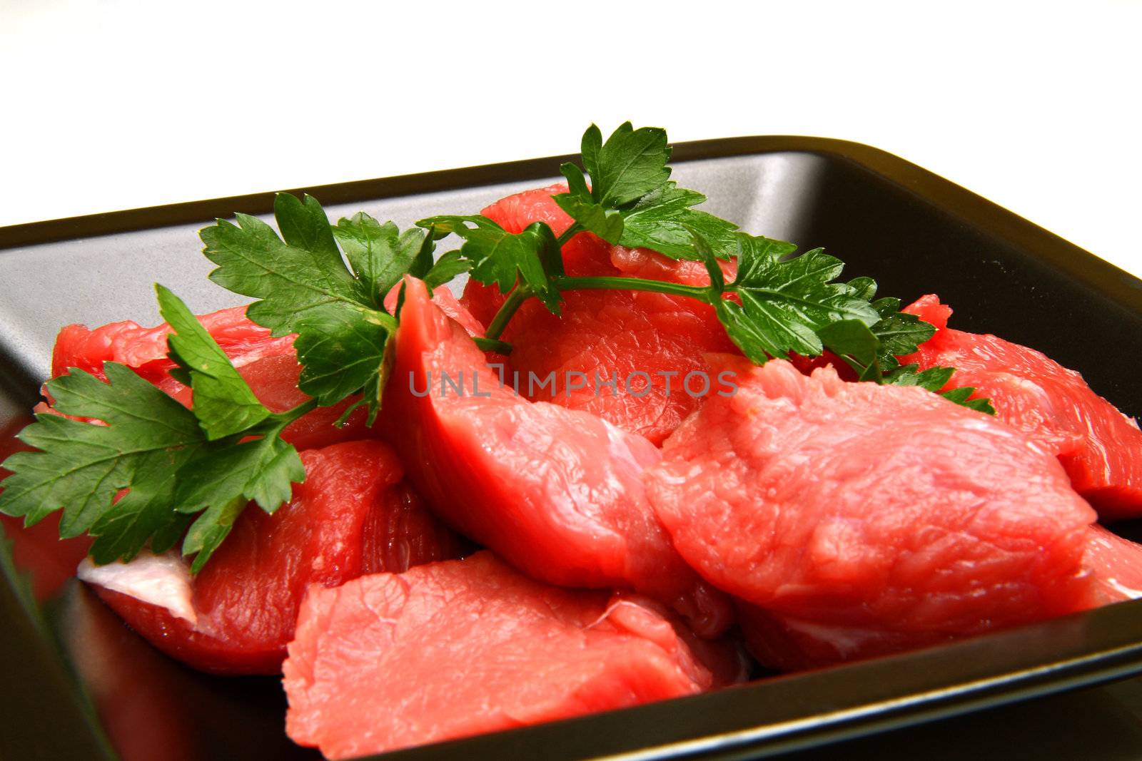 Raw fresh meat sliced in cubes