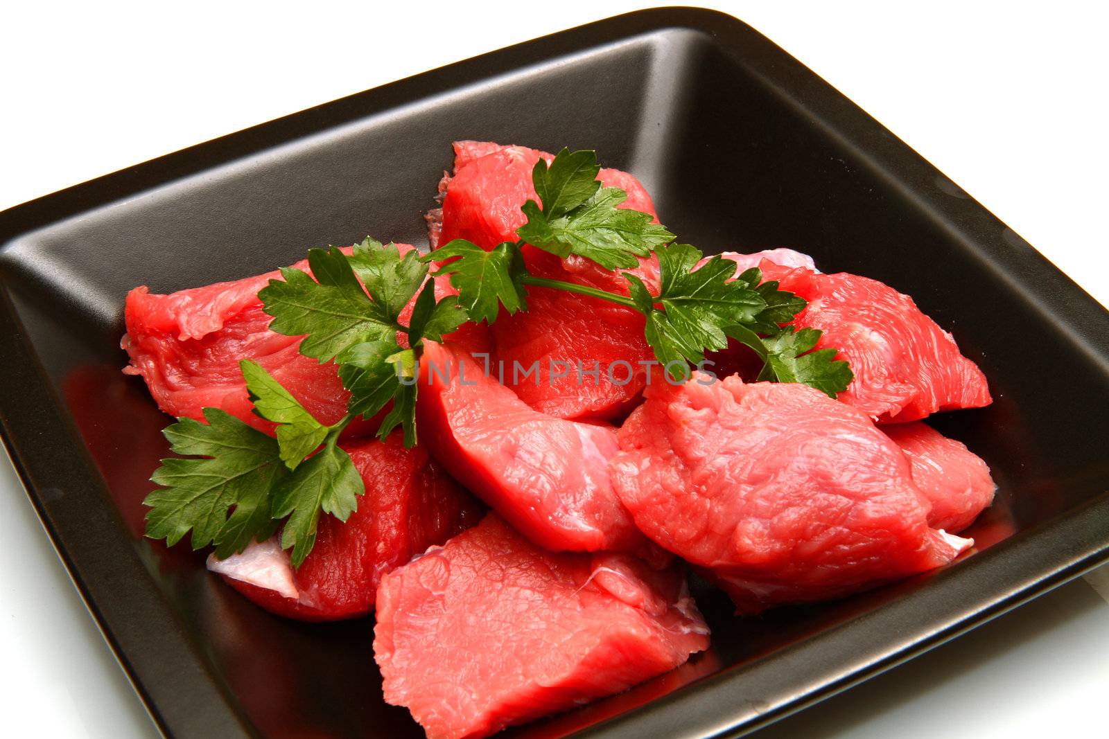 Raw fresh meat sliced in cubes