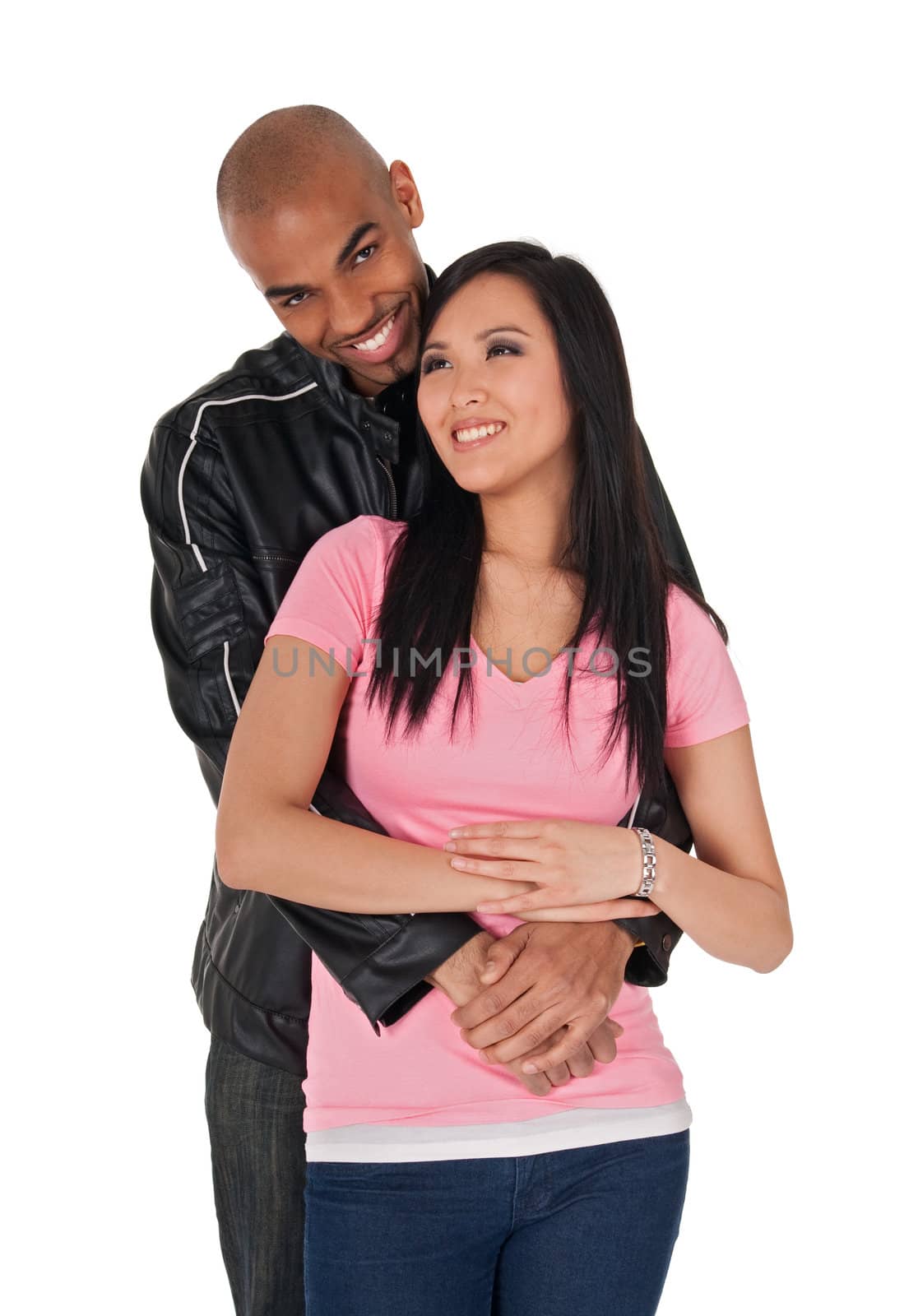 Young loving couple smiling - African American guy with Asian girlfriend.