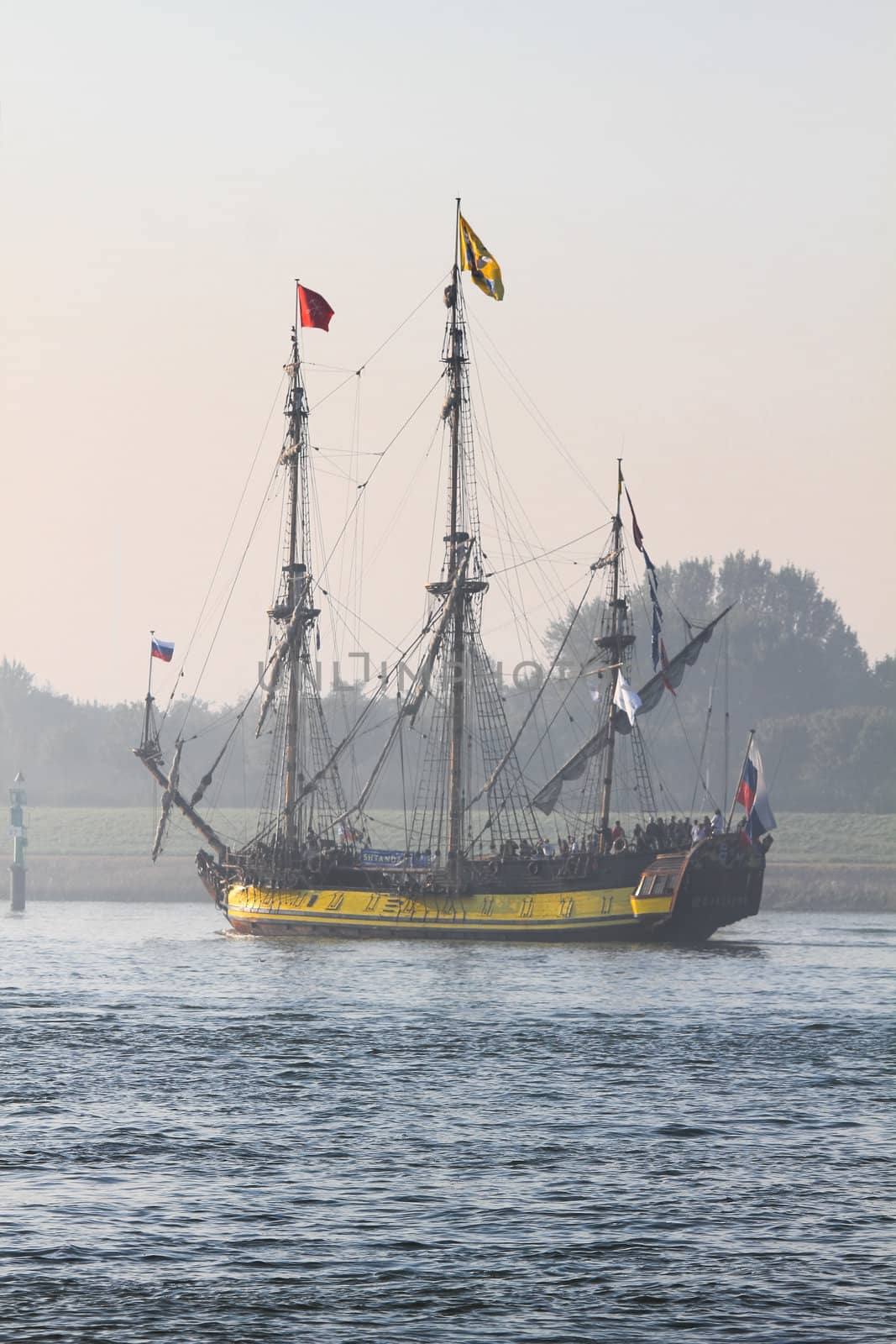 MAASSLUIS-OCTOBER 02: The replica of the Russian frigate Shtandart leaving harbor of Maassluis on a journey to Dordrecht after visiting Furiade , October 02, 2011, Maassluis, the Netherlands