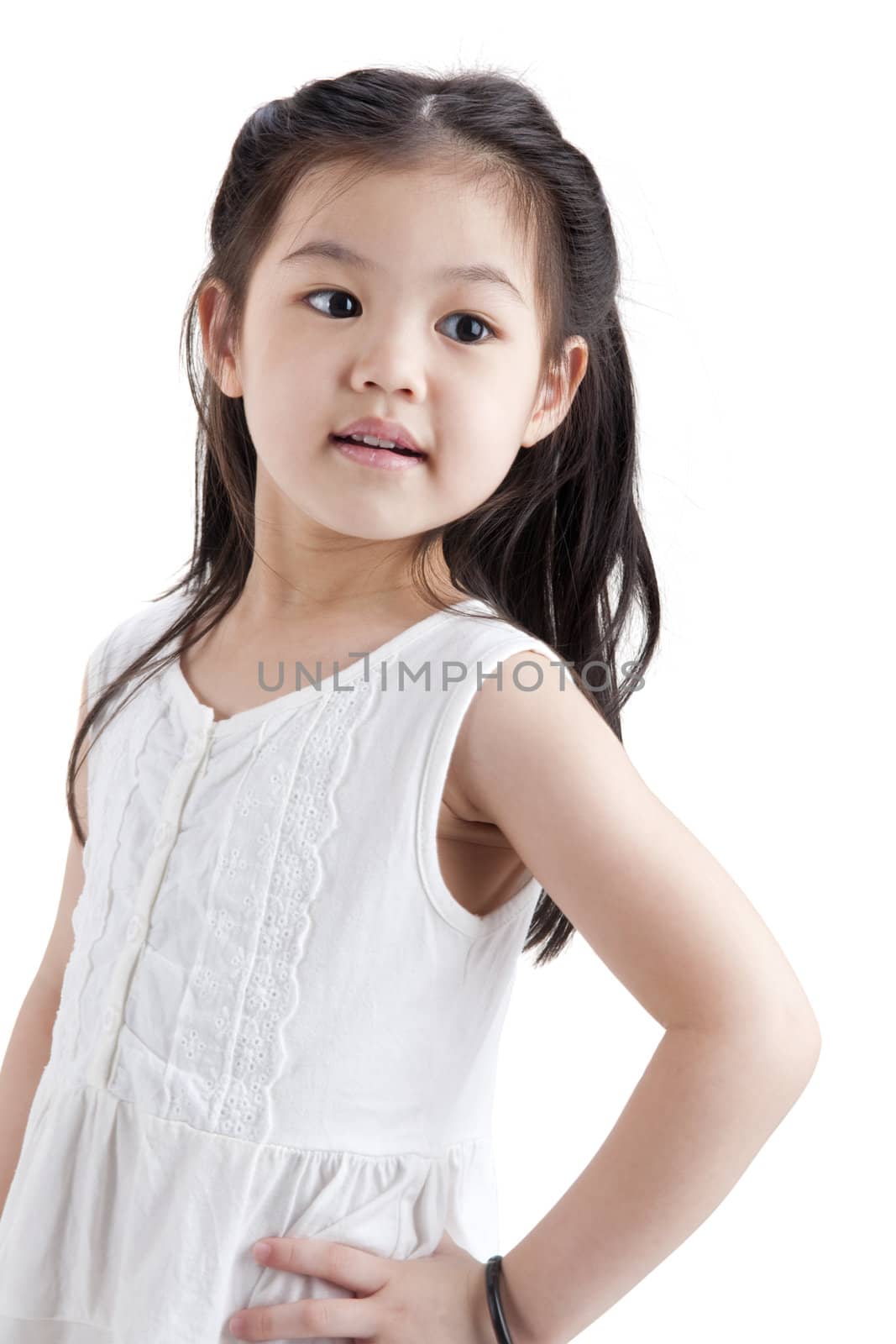Little Asian girl in white dress on white background