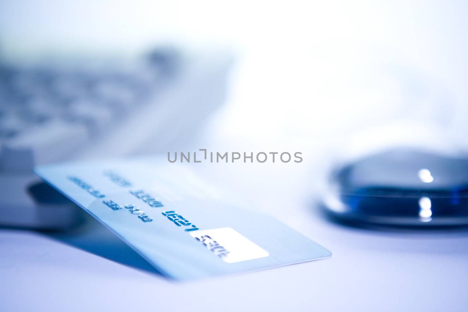 Credit card and computer. Online shopping.