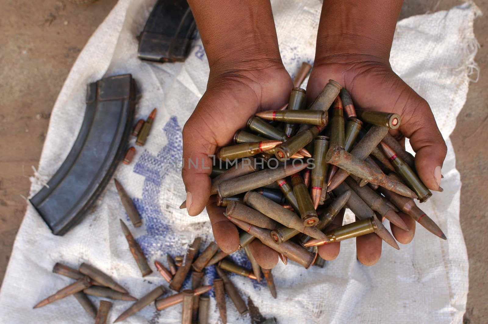 bullets in the hands of an African