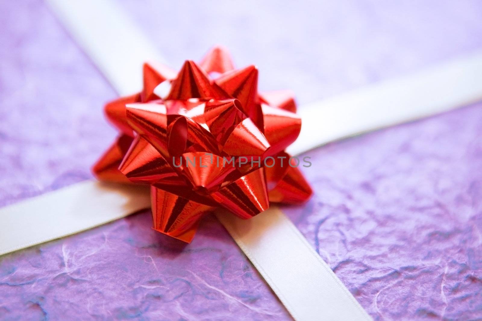 Gift with a red ornament