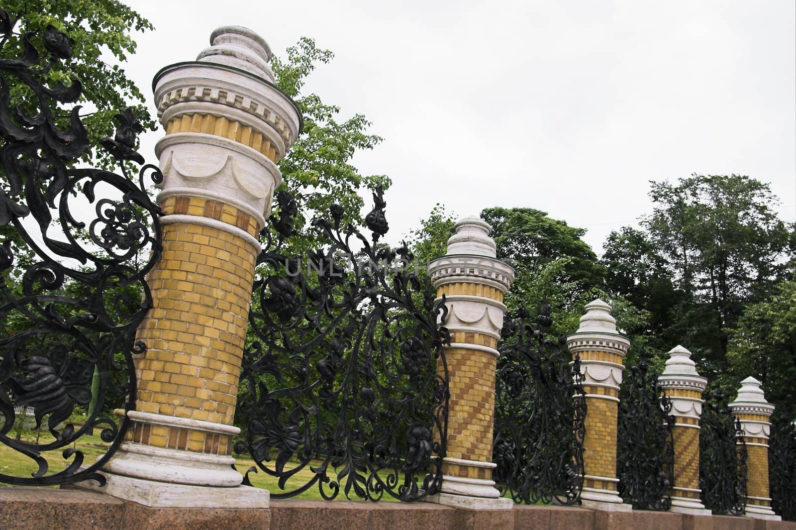 Iron Fence of the Mikhailovsky Garden in Saint Petersburg, Russia.