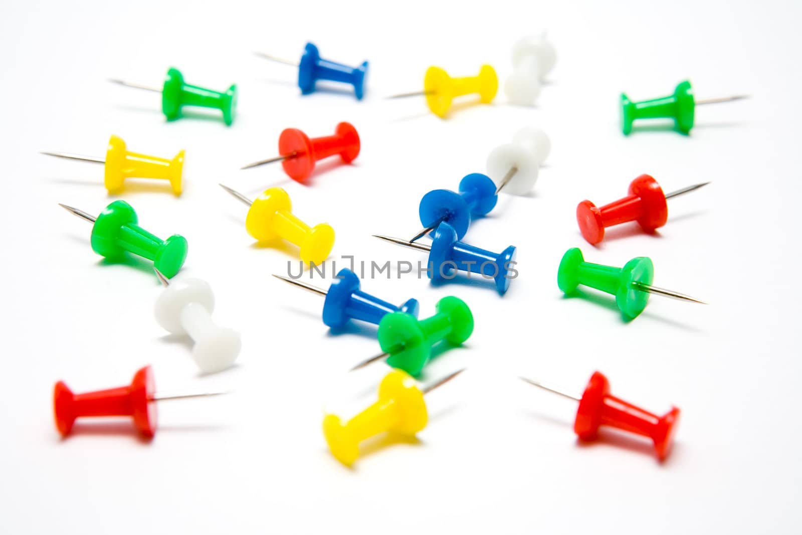 Pushpins on a white background