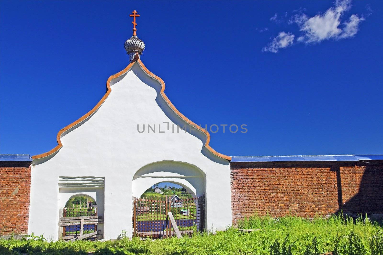 Gates to ancient Russian orthodox monastery by simfan