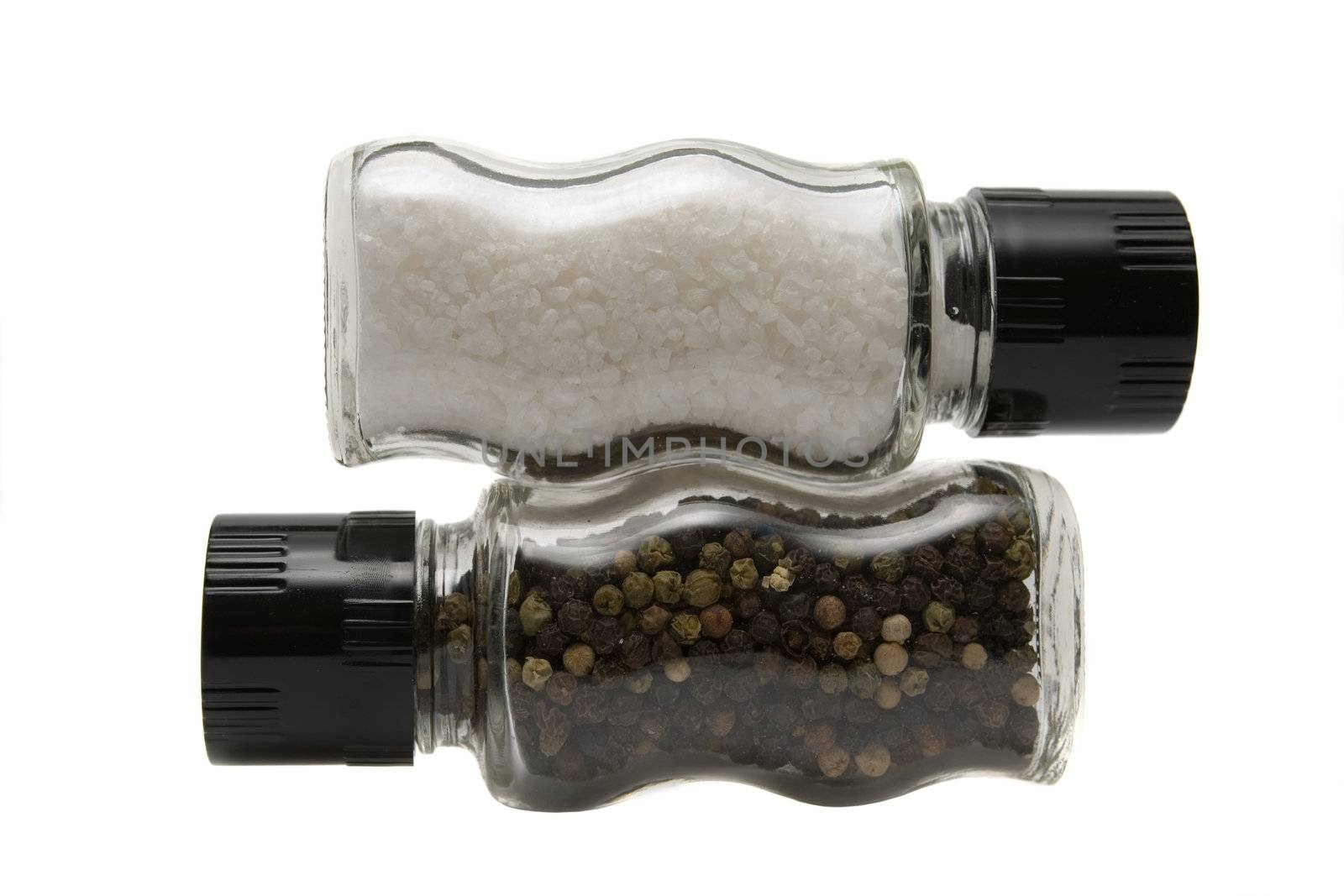 Salt and pepper grinders on a white background