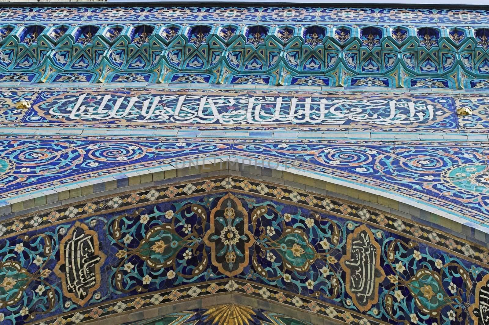 Fragment of a tiled wall with Arabic mosaic of an ancient mosque in Saint Petersburg, Russia.