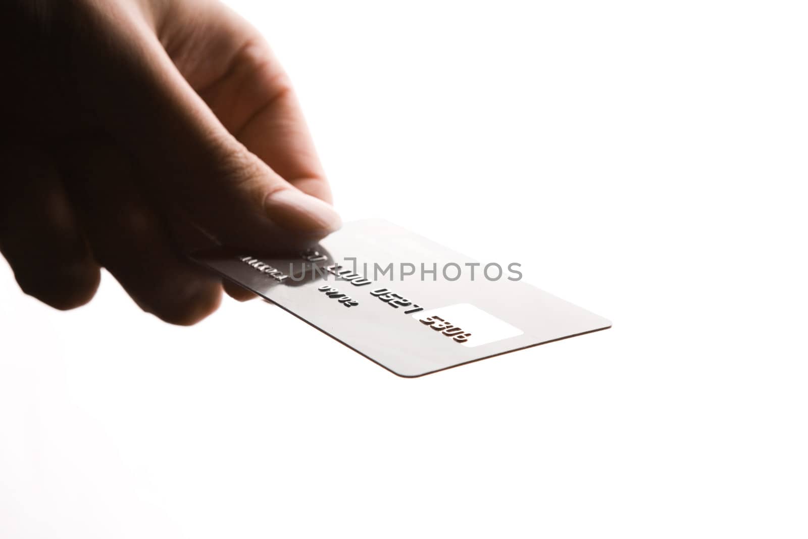 Hand holding a credit card