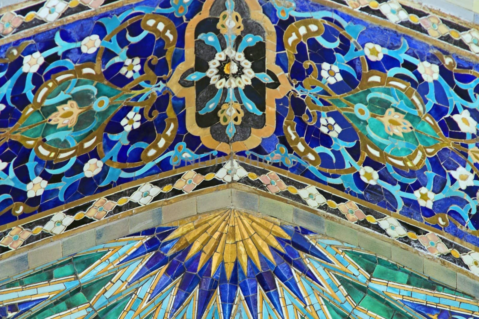 Fragment of tiled wall with Arabic mosaic of ancient mosque in Saint Petersburg, Russia.