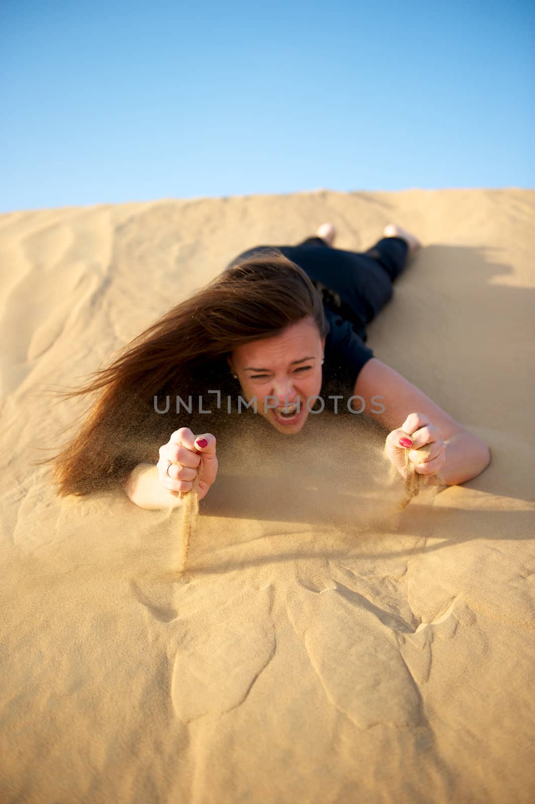 Woman enjoying the desert in Dubai, United Arab Emirates