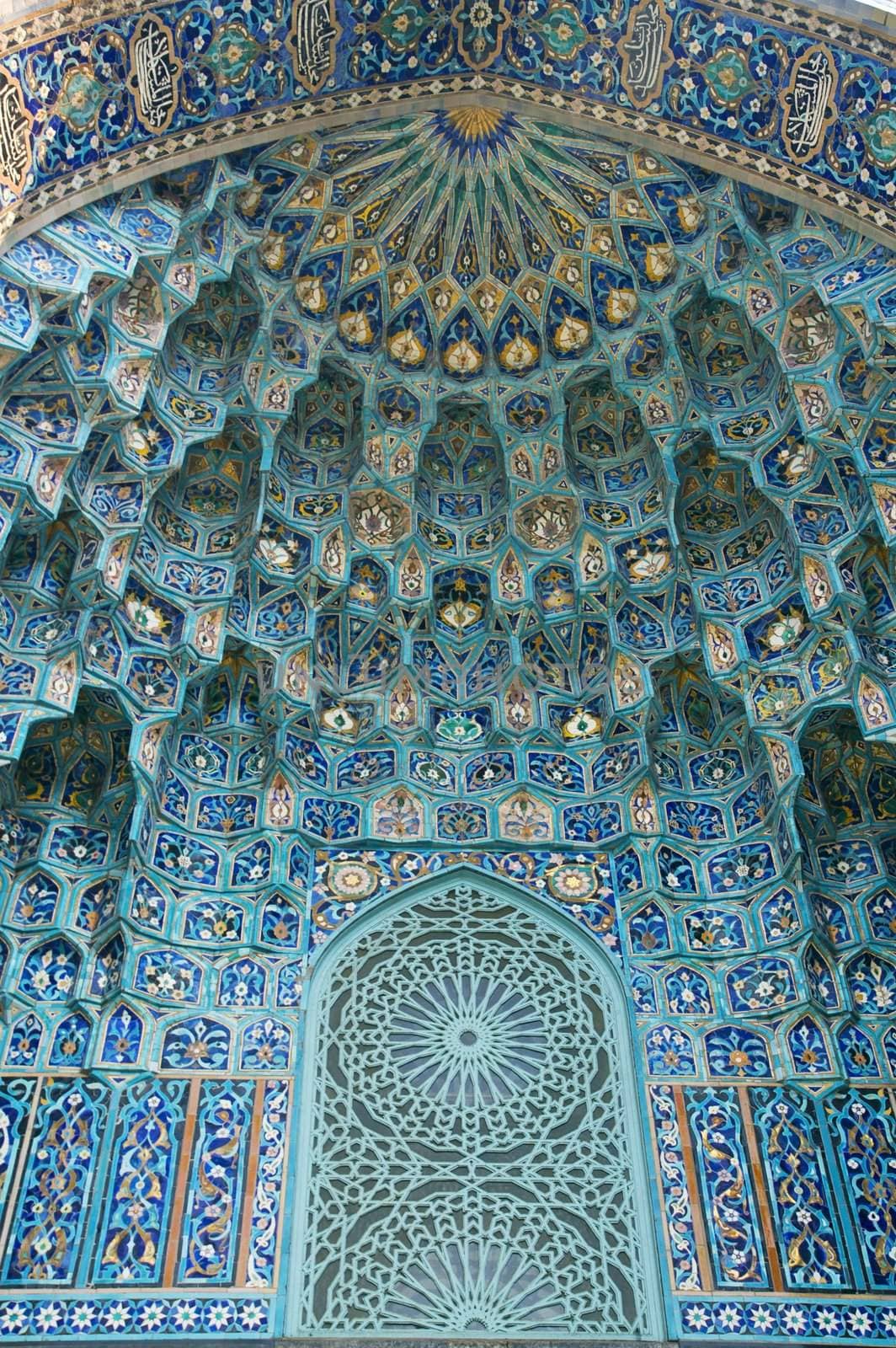 Fragment of a tiled wall with Arabic mosaic of an ancient mosque in Saint Petersburg, Russia.