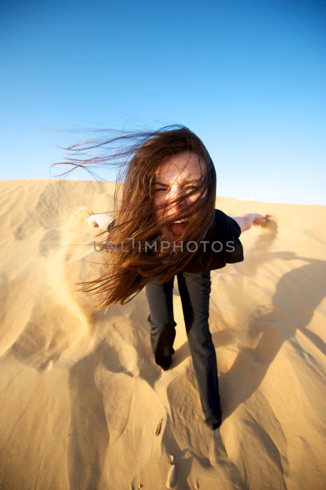 Woman enjoying the desert in Dubai, United Arab Emirates