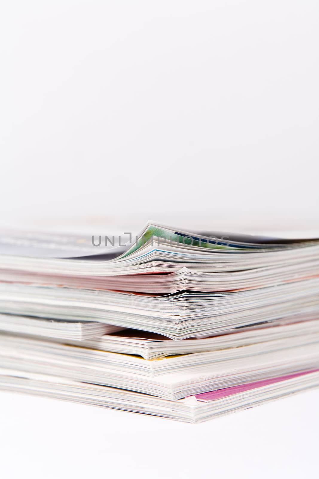 Stack of glossy periodical magazines