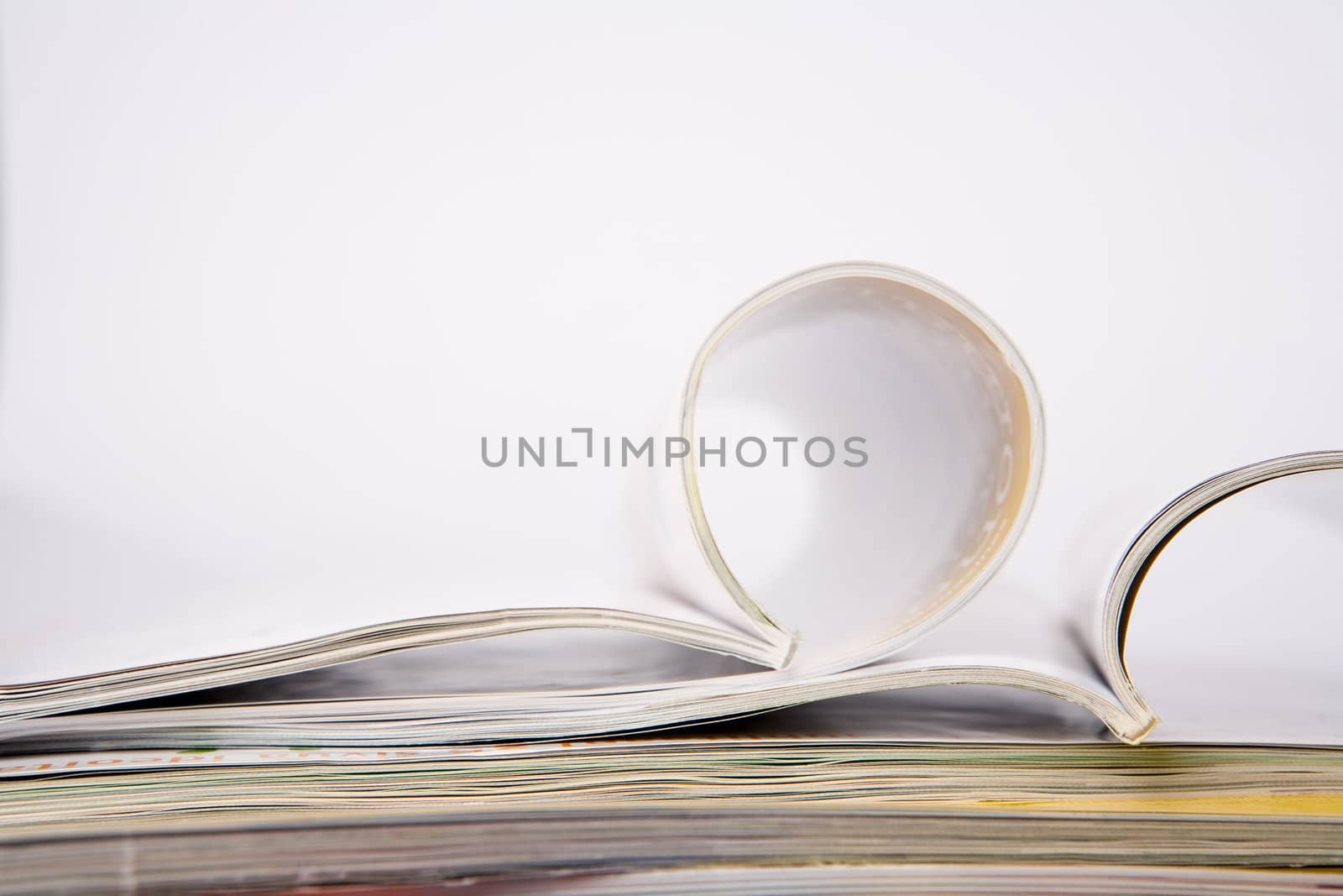 Stack of glossy periodical magazines