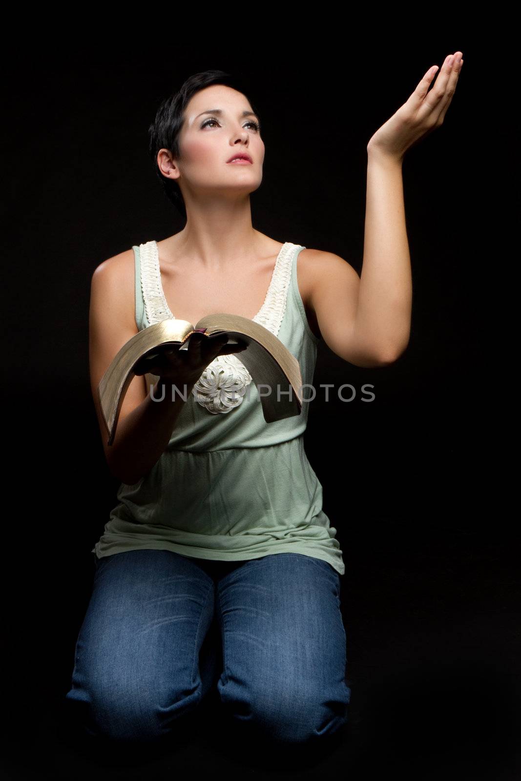 Religious woman reading christian bible