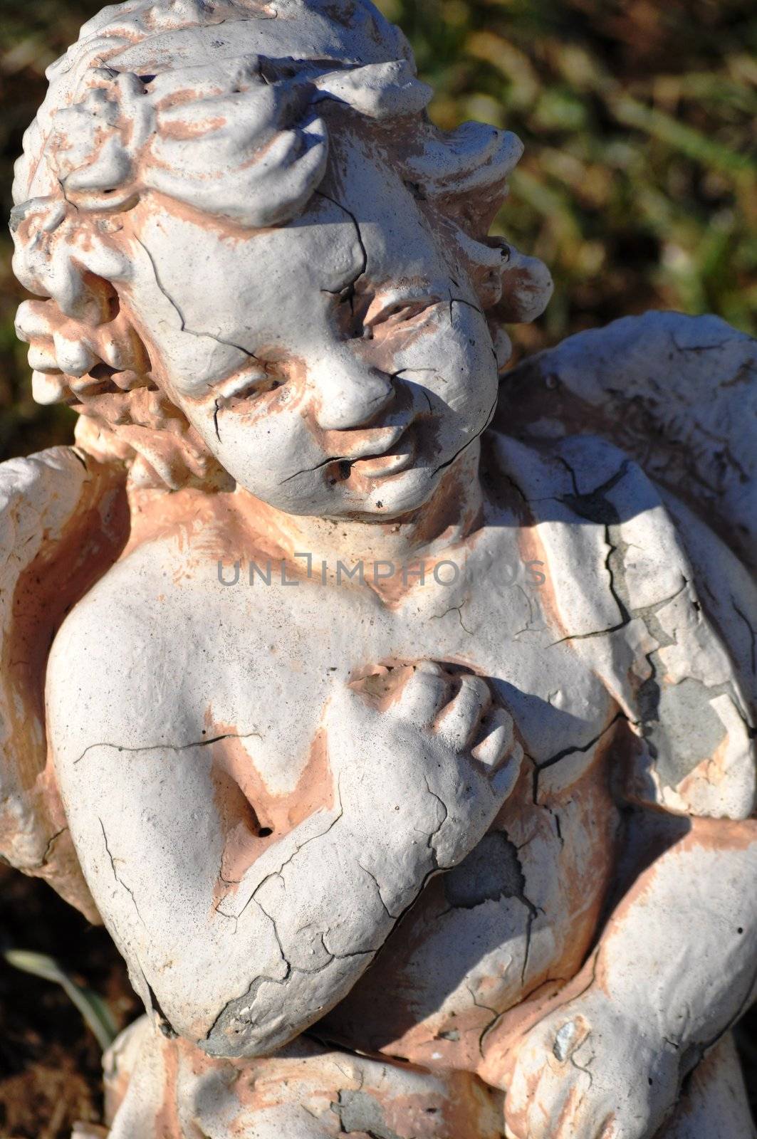 Gravesite - Angel - stares close up by RefocusPhoto