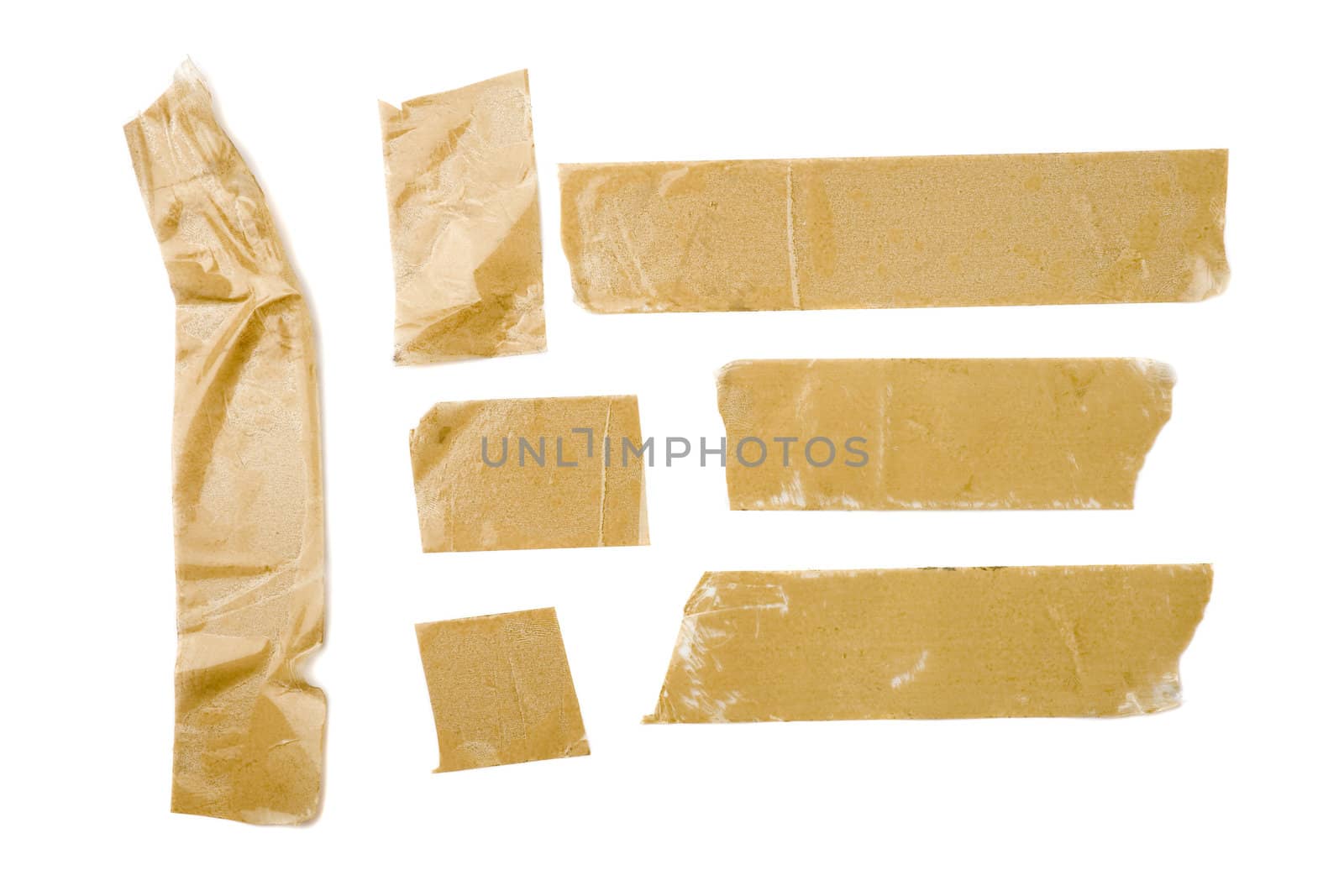 Strips of brown adhesive packaging tape isolated on white background