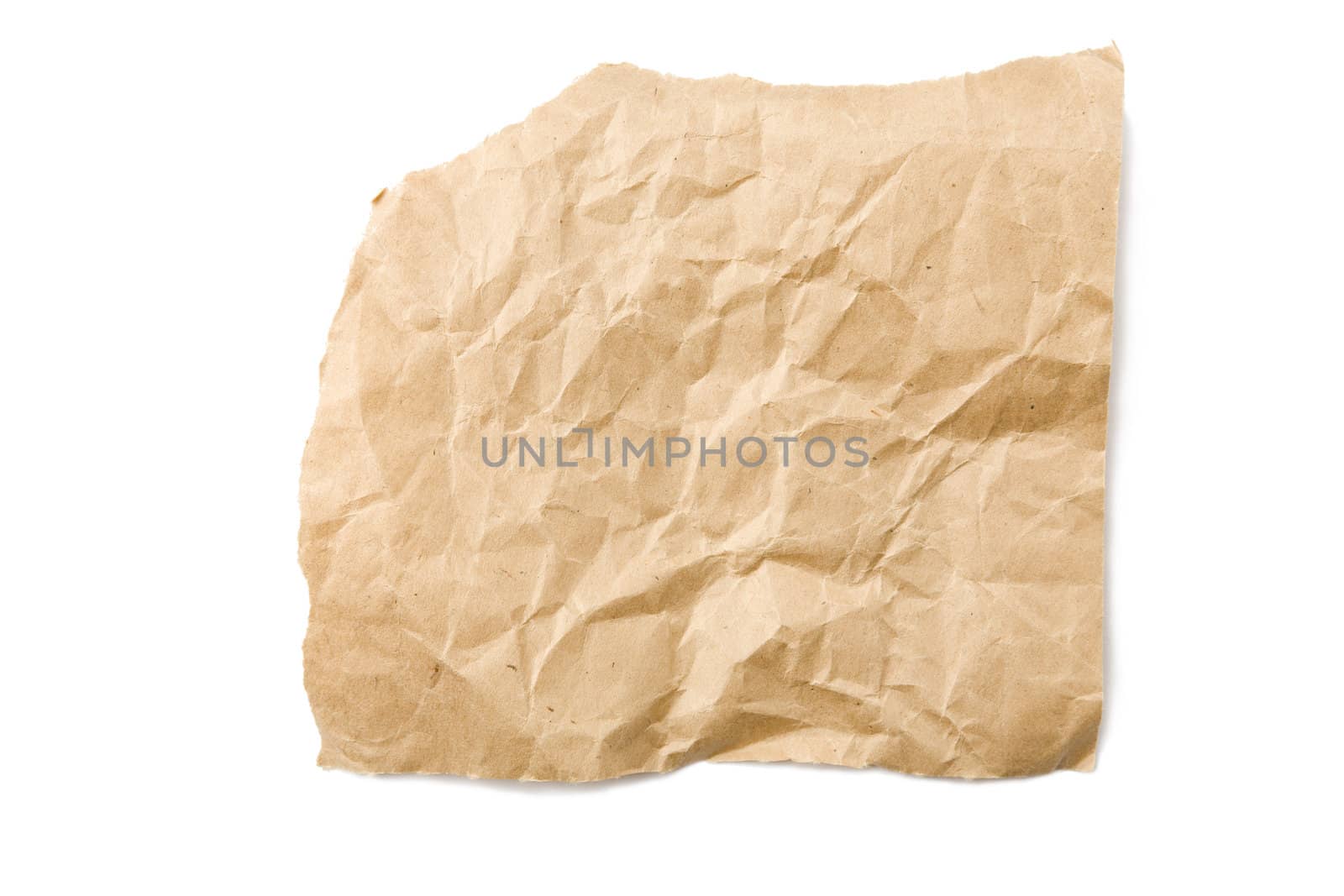 Piece of crushed brown  paper isolated on white background with shadow