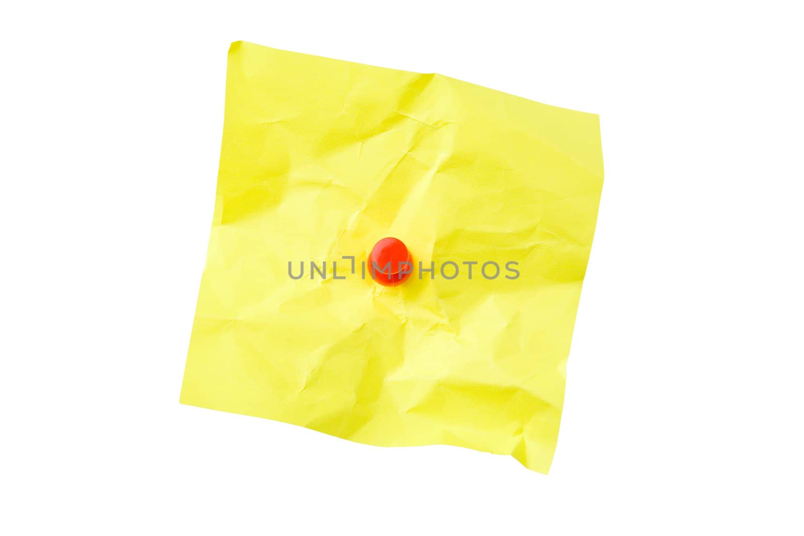 Yellow crushed sticky note with pushpin in center isolated on white background with clipping path