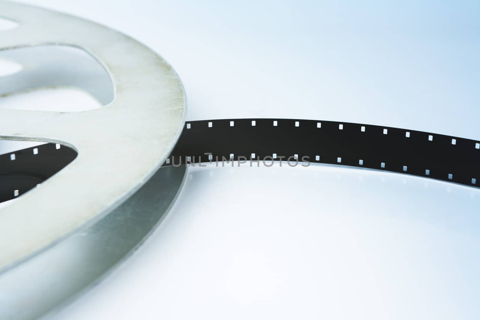 Old vintage film reel with 16 mm film