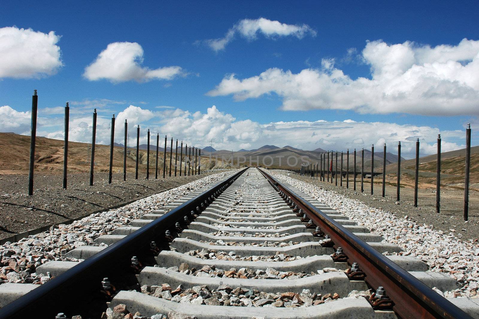 Railroad tracks extending to the distant in Tibet