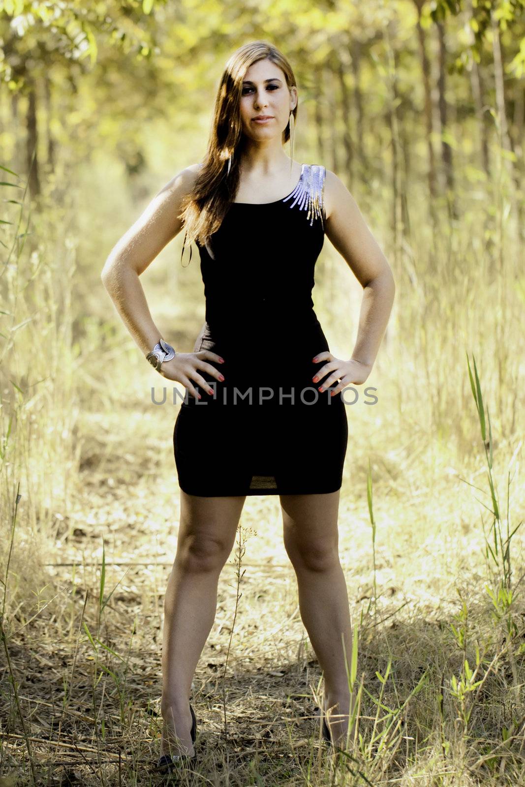 View of a beautiful woman on a forest