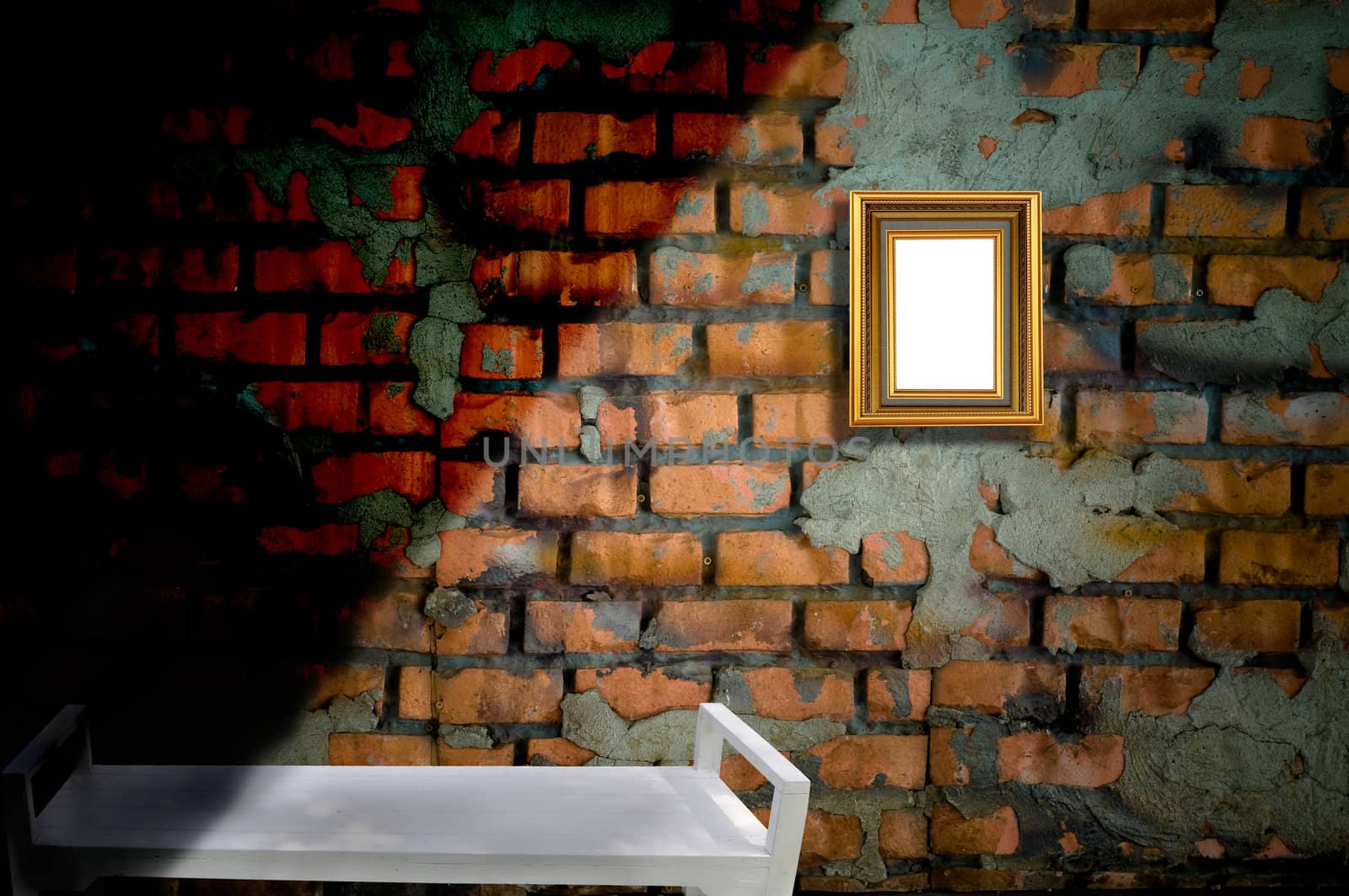 picture frame on the old brick wall and the shadow